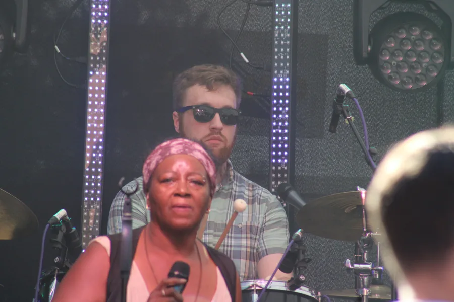 Singer and drummer on stage