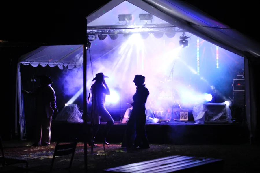 Bright stage lighting through haze